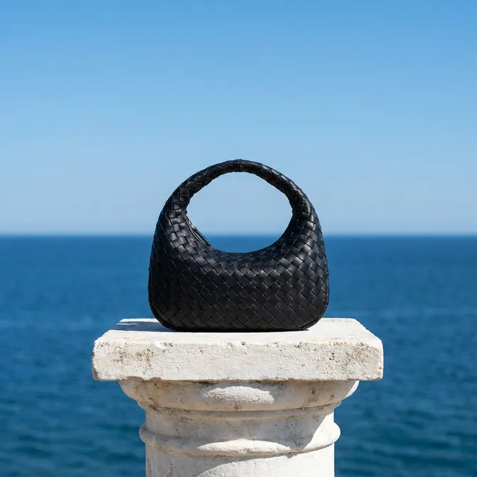 Woven leather bag by the sea